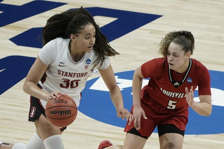 Stanford's Haley Jones tries to drive past Louisville's Mykasa Robinson