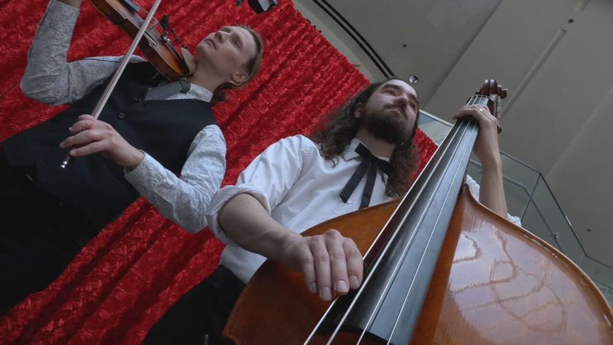 A Bluegrass band plays at Louisville Muhammad Ali International Airport ahead of Derby weekend