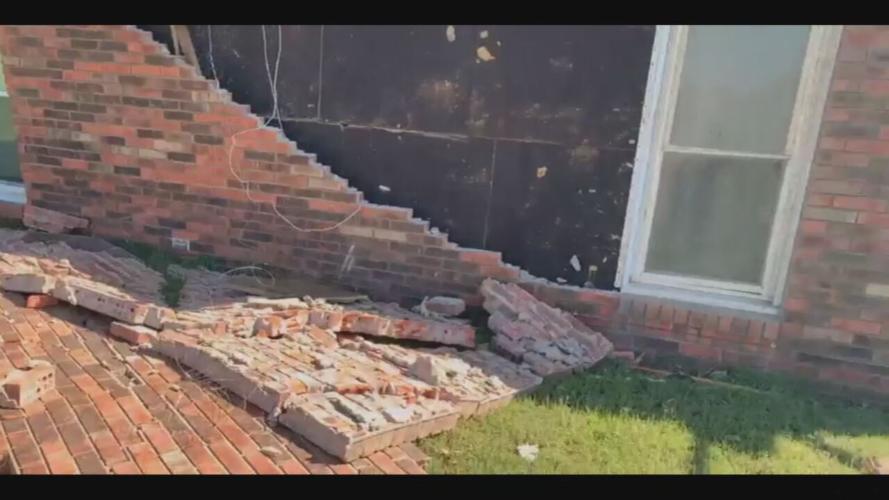 Bricks peeled away from storm damaged home
