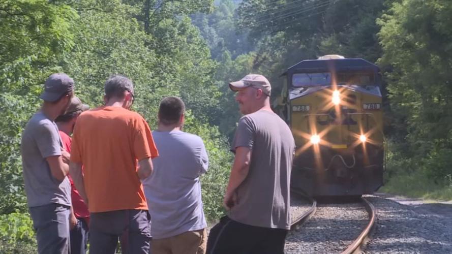 Former coal miners from Blackjewel LLC block train near Cumberland, Ky.