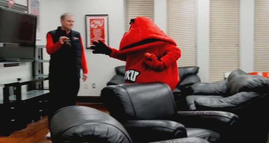 BIG RED MOVES INTO COACHES OFFICE