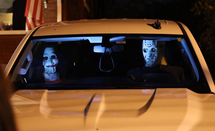 Halloween characters inside of a truck.JPG