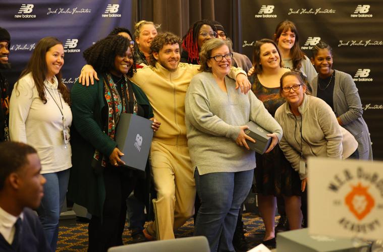 Group of people pose for photo with Jack Harlow.JPG