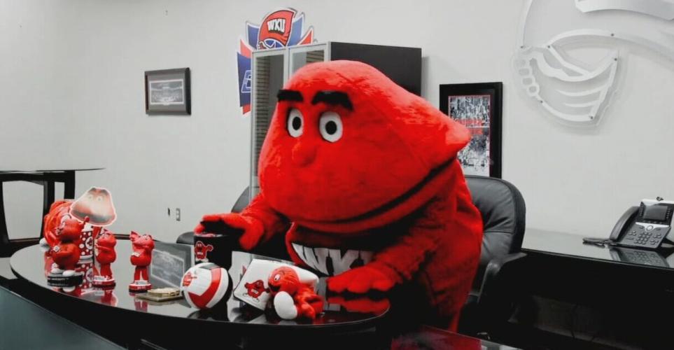 BIG RED MOVES INTO COACHES OFFICE