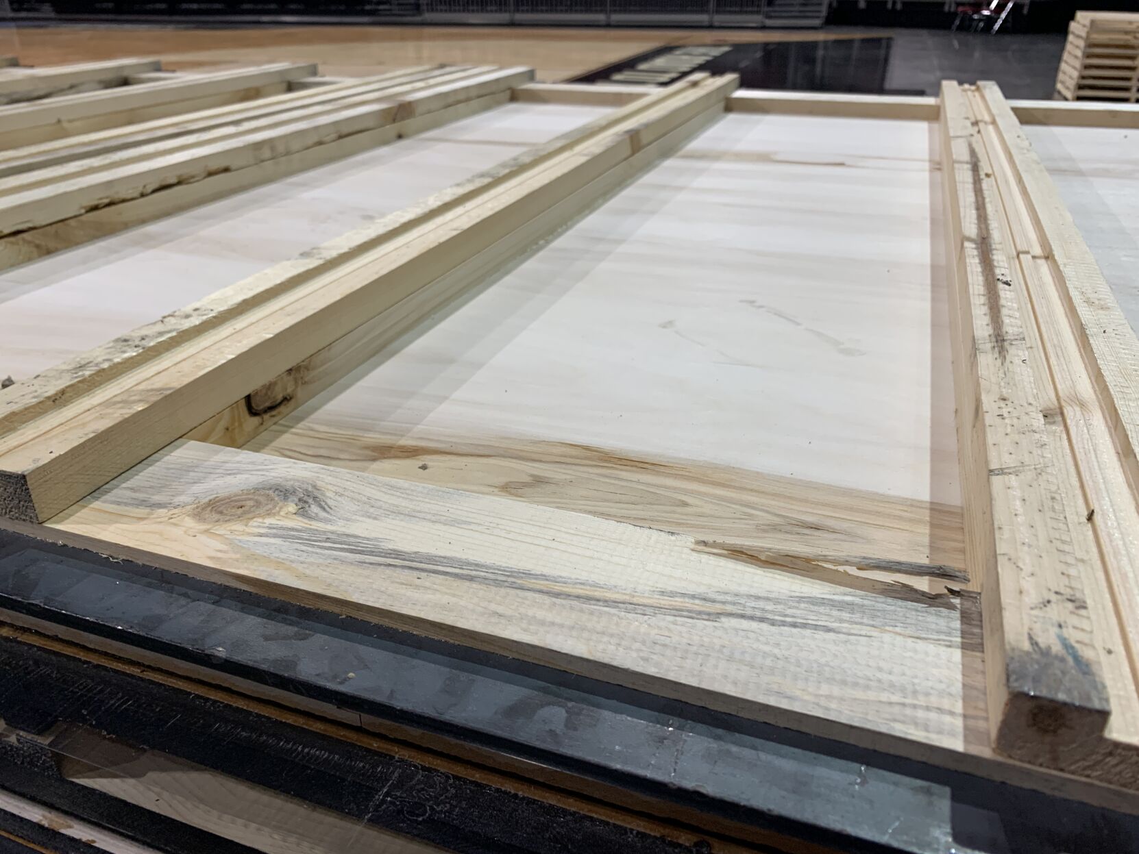 NCAA FLOOR  BEING INSTALLED AT YUM CENTER 3-21-2023 (24).JPG