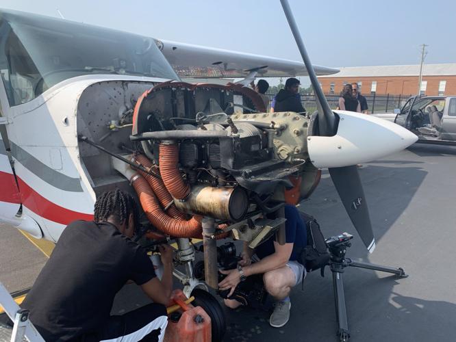 Shawnee students dismantle airplane to be used for training aviation students