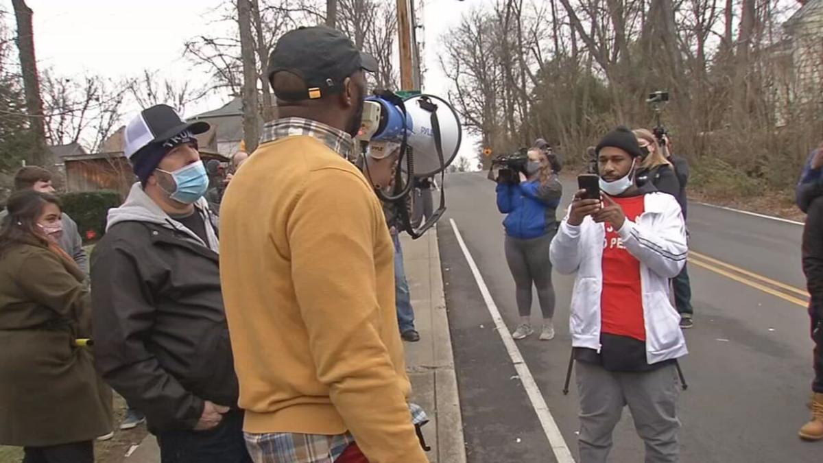 Protesters gather outside Mitch McConnell's home 1-02-21