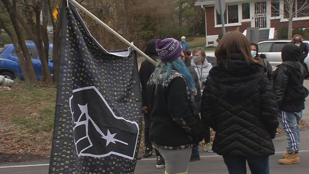 Protesters gather outside Mitch McConnell's home 1-02-21