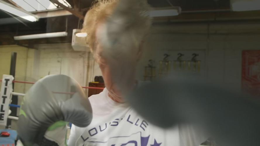 BOXING GRANDMA 5pPKG.transfer_frame_836 punch.jpg