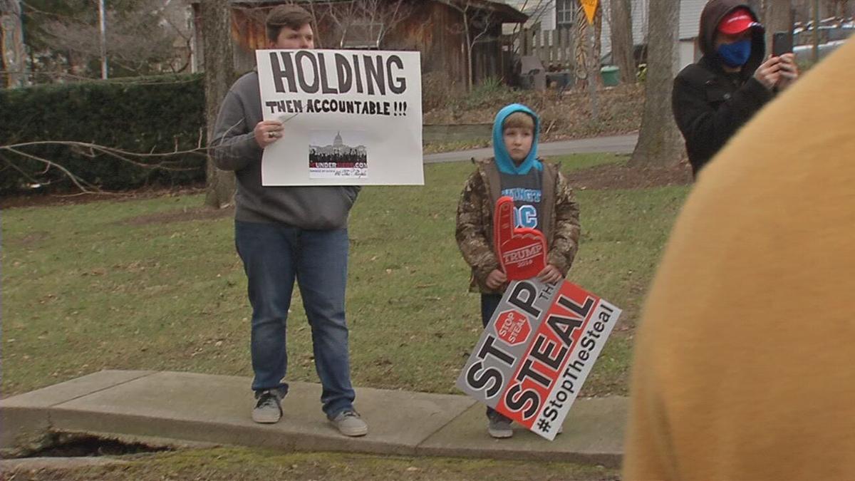 Protesters gather outside Mitch McConnell's home 1-02-21