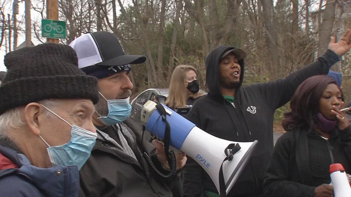 Protesters gather outside Mitch McConnell's home 1-02-21