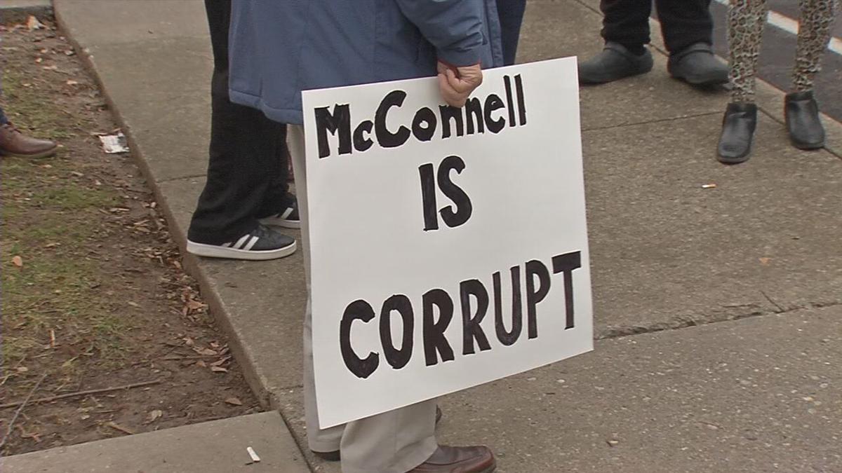 Protesters gather outside Mitch McConnell's home 1-02-21