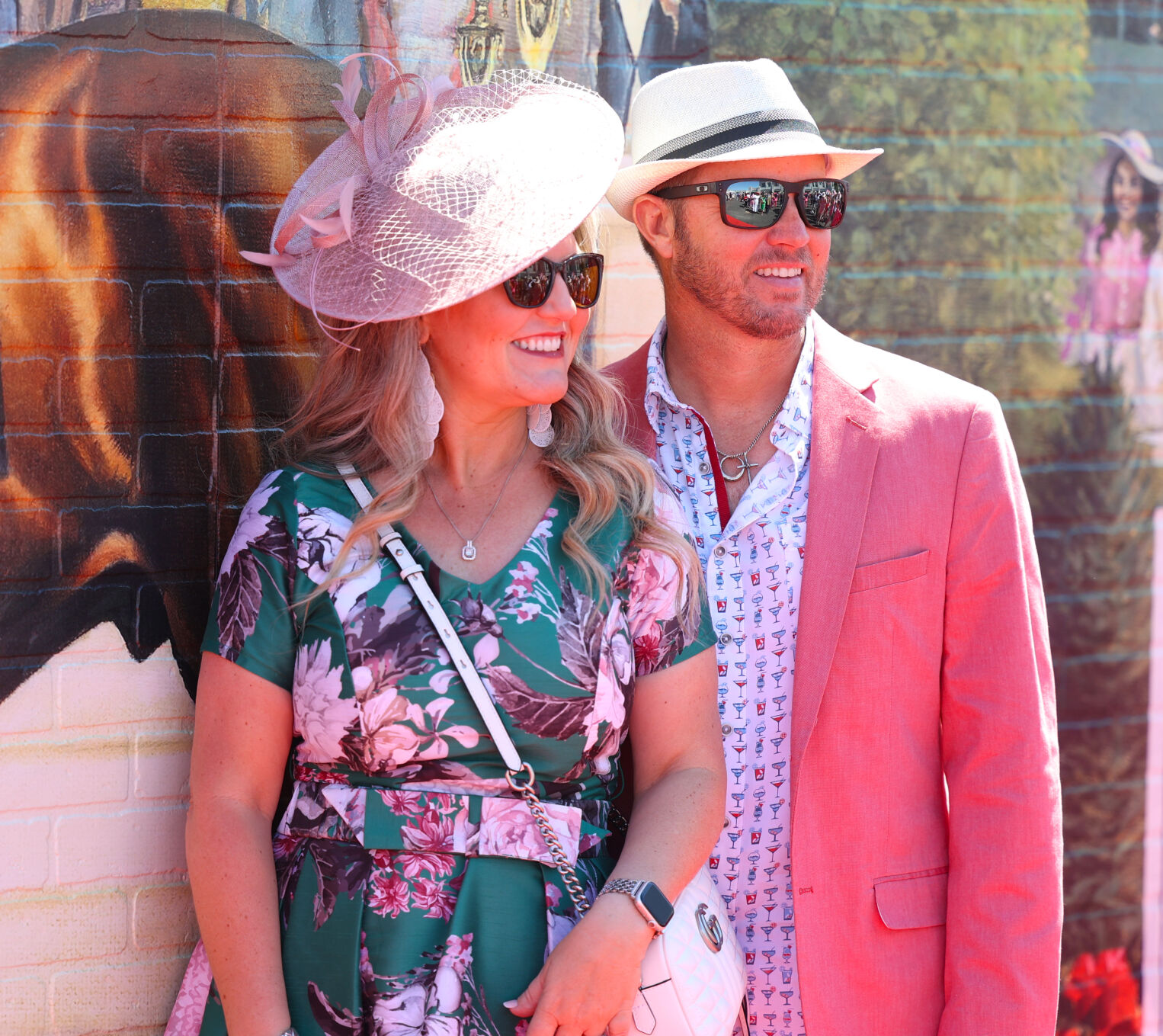 Couple takes photo at wall.JPG