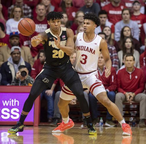 Purdue guard Nojel Eastern (20) makes a pass as Indiana forward Justin Smith