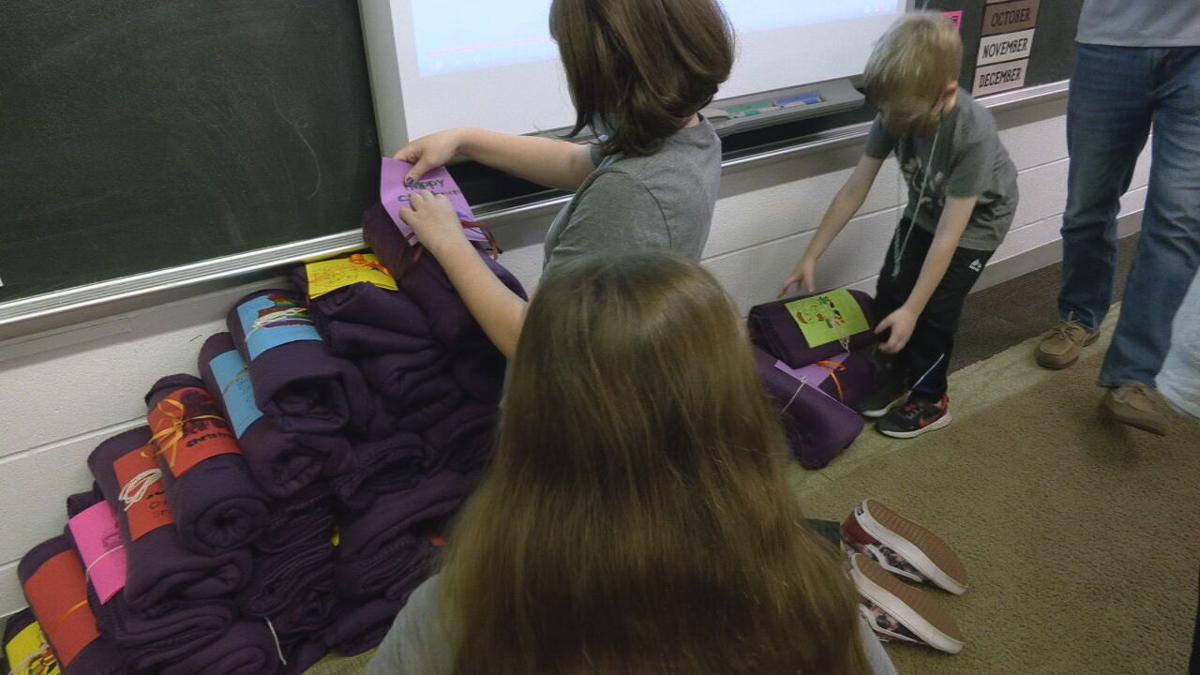 Ascension students assemble blankets for homeless