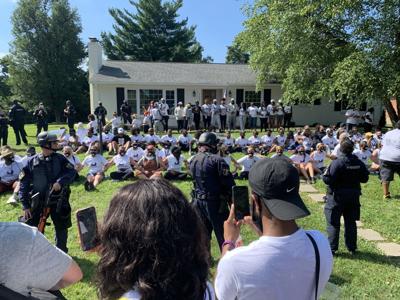 Protesters sit at Daniel Cameron's home 7-14-20