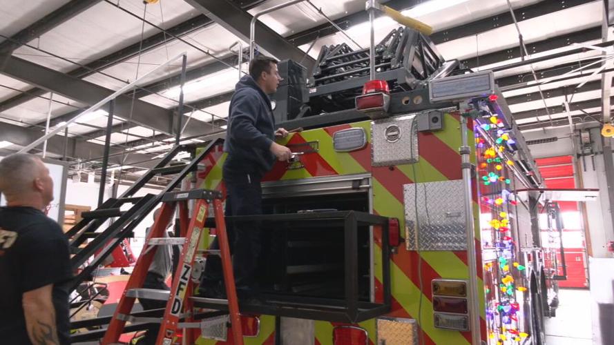 zoneton fire dept decorates truck.jpeg