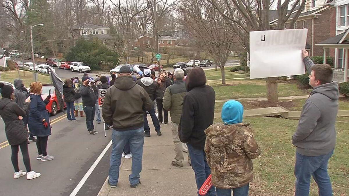 Protesters gather outside Mitch McConnell's home 1-02-21