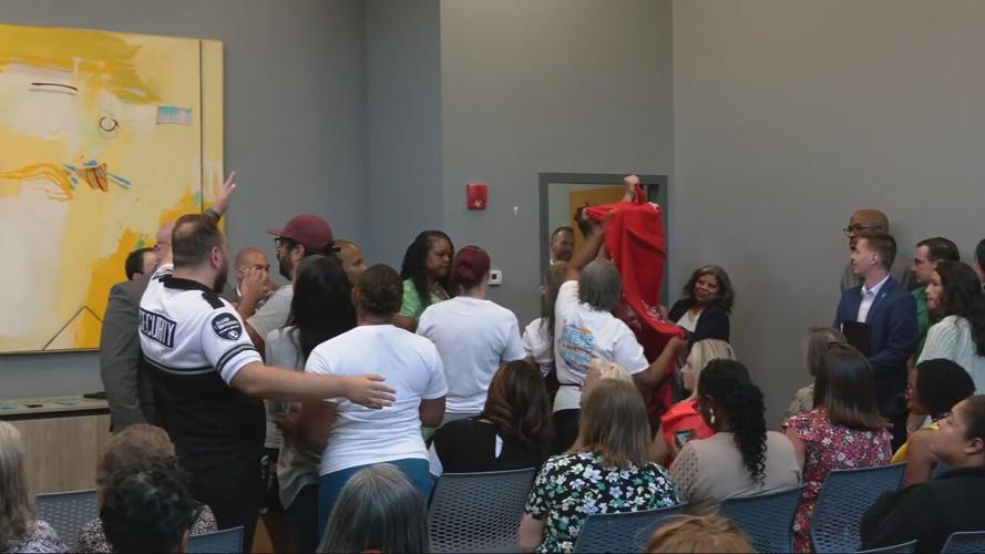 PROTESTORS AT MAYOR NEWS CONFERENCE (1).jpeg