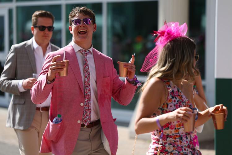 Man looks at camera during Oaks.JPG