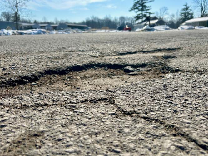 CREWS WORKING ON POTHOLES AFTER WINTER STORM 3.jpg