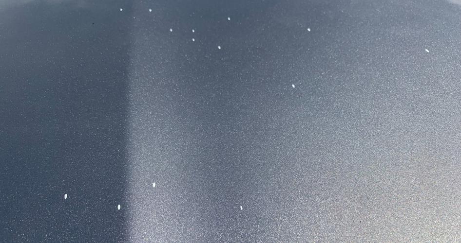 Spatter from paint that dripped from the Sherman Minton Bridge onto Mike Scheser's car