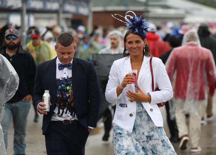 People walk in infield - May 3.JPG