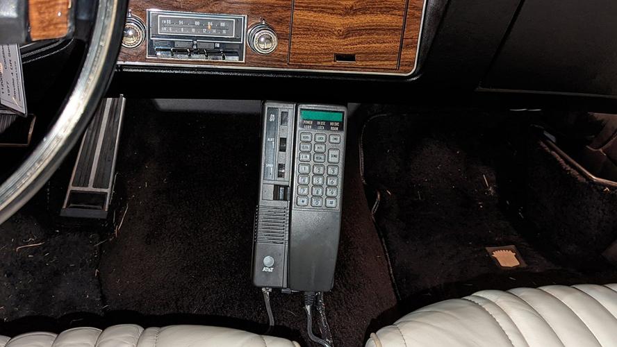 Betty White Cadillac - interior with mobile phone