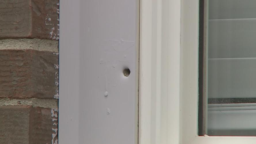 Bullet hole near Taylor's apartment