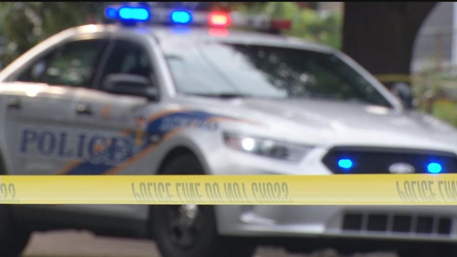 LMPD CAR WITH LIGHTS AND CRIME SCENE TAPE