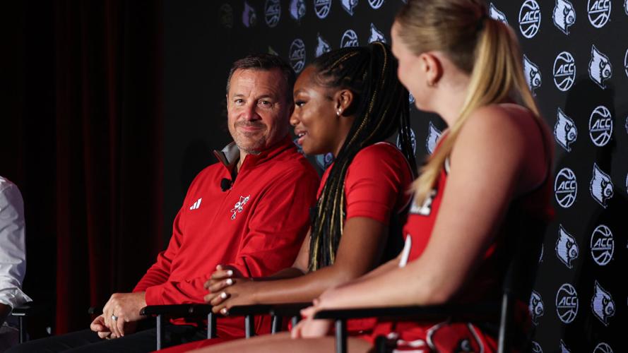 Jeff Walz, Tajianna Roberts and Laura Ziegler
