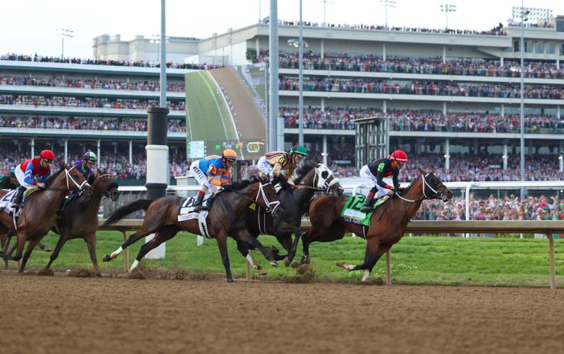 Horses move toward after First Turn at Kentucky Derby 150.JPG