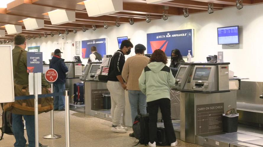 Travelers in the check-in area at Louisville Muhammad Ali International Airport