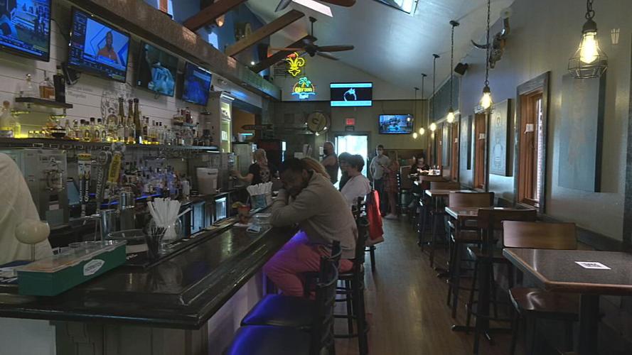 Patrons eating at a bar (generic)