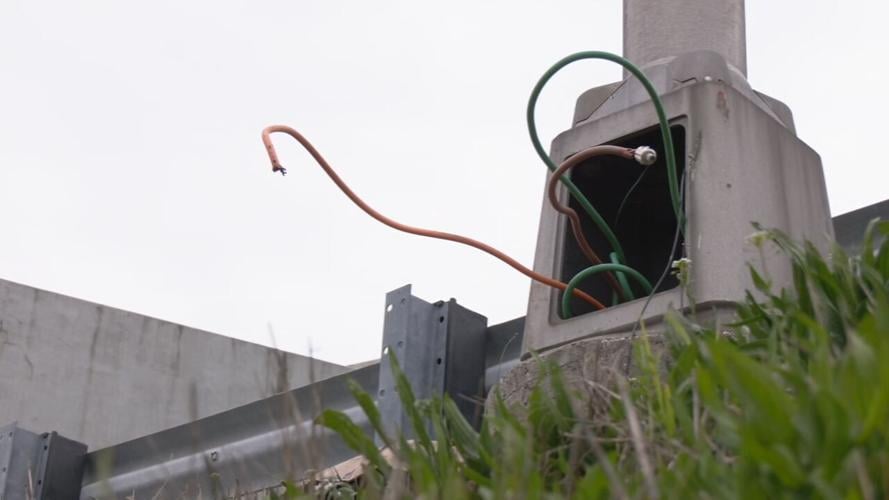 Exposed wires on a interstate light pole caused by copper thieves - 3.22.24