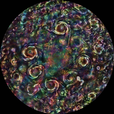 CYCLONES OF COLOR At Jupiter’s North Pole...