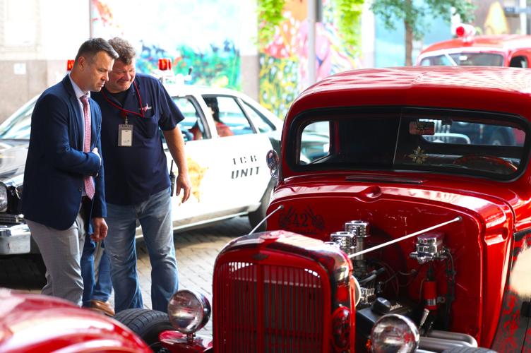 Two men talk about Street Rods.JPG