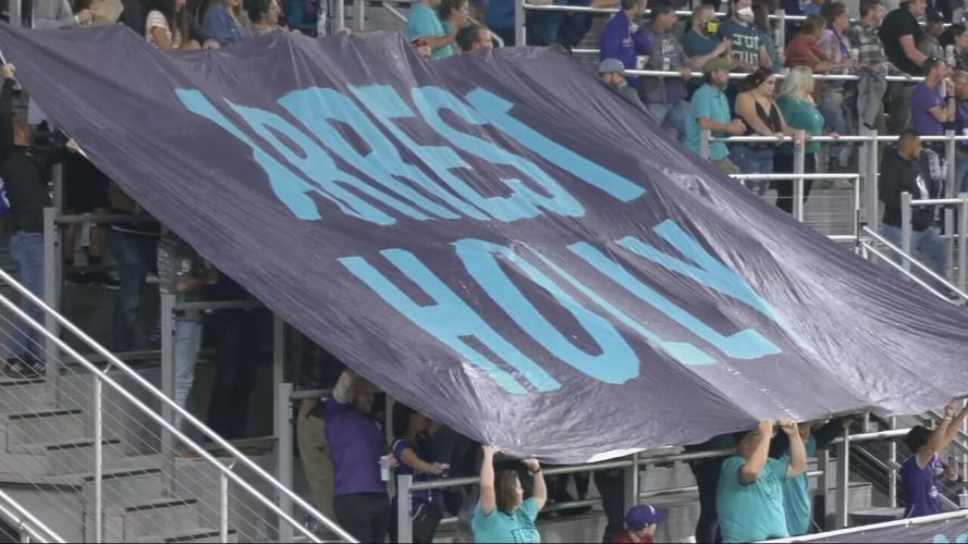 Arrest Holly banner at LouCity FC 10-5-22.jpeg