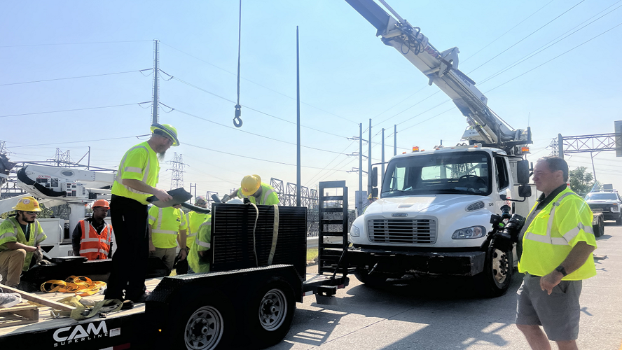 KYTC workers install solar lights