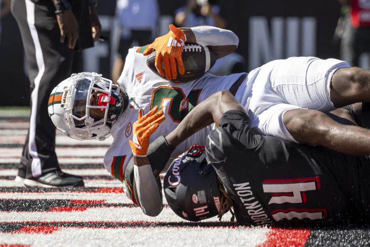 CRAWFORD Louisville's big plays can't Miami, Ward in 5245