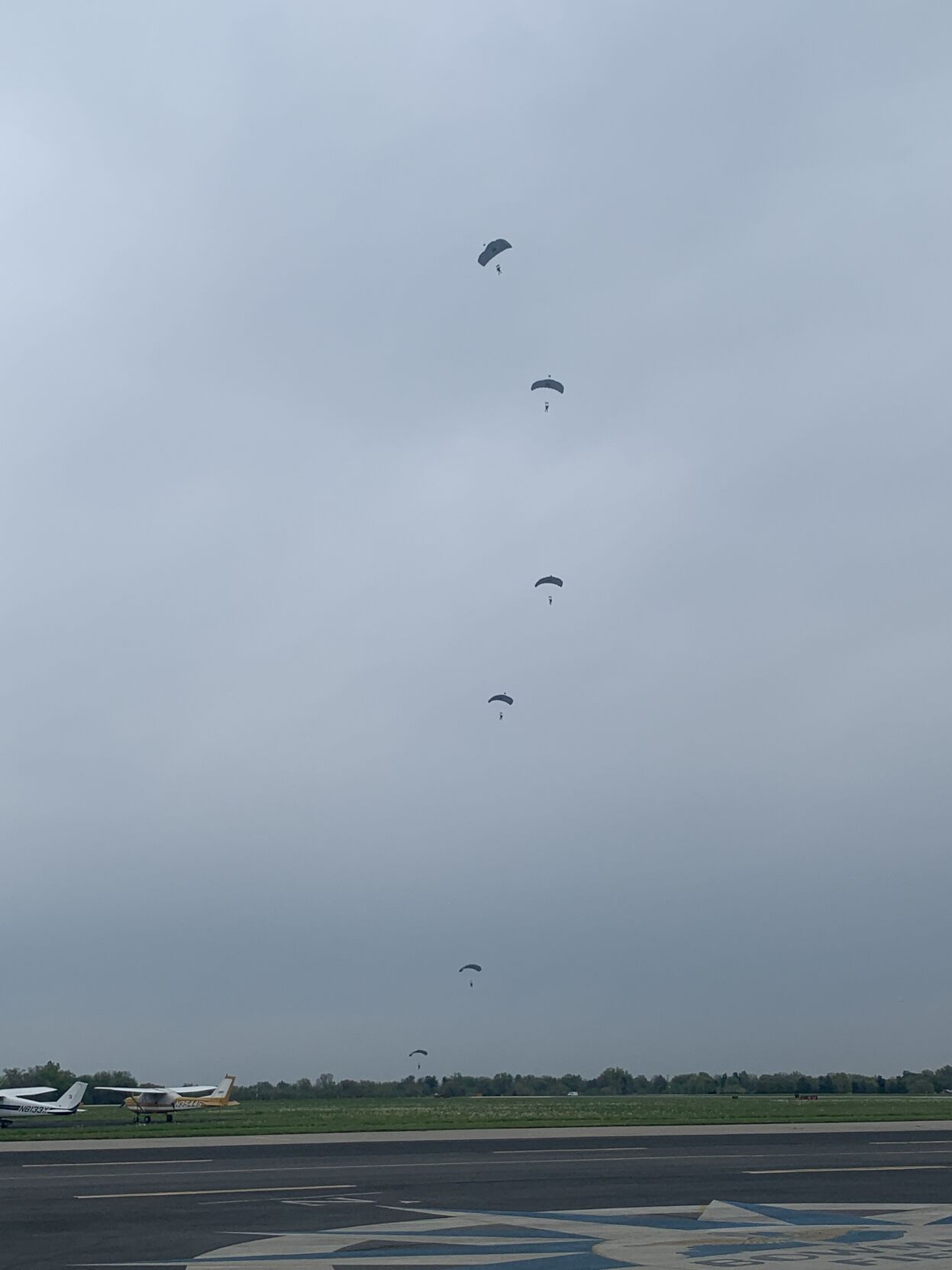 Paratroopers descend from the sky during the 2021 Thunder Over Louisville air show at Bowman Field