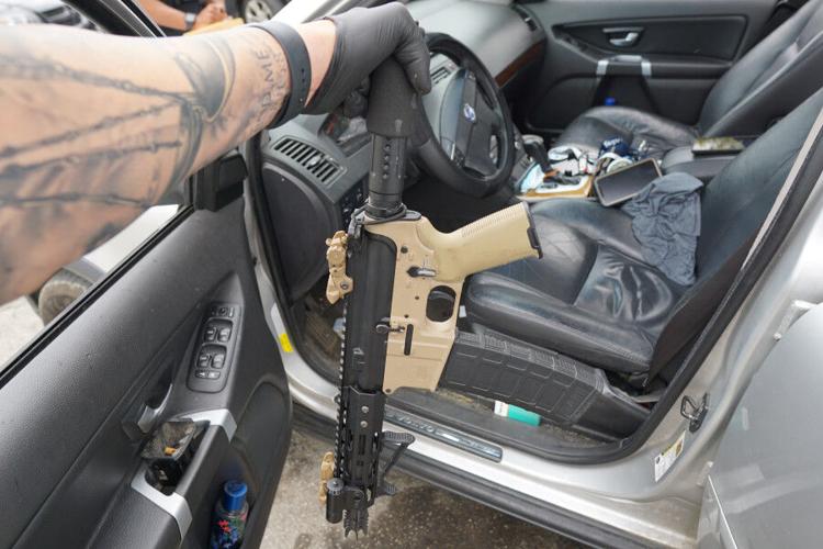 Gun seized by Indianapolis Metropolitan Police Department on April 28, 2021 after searching vehicle at gas station