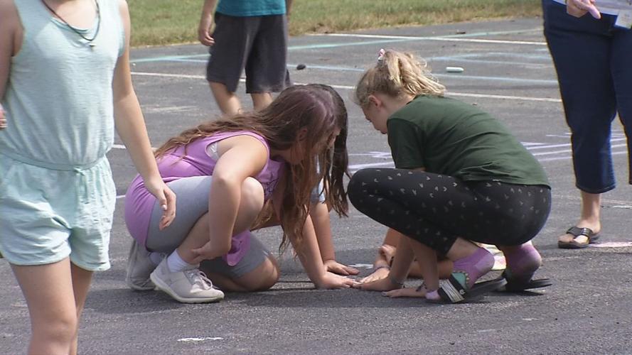 Community Montessori students mark future site of Casa Dei Curiosity