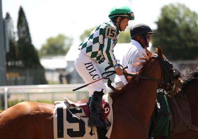 jockey cools down horse.JPG