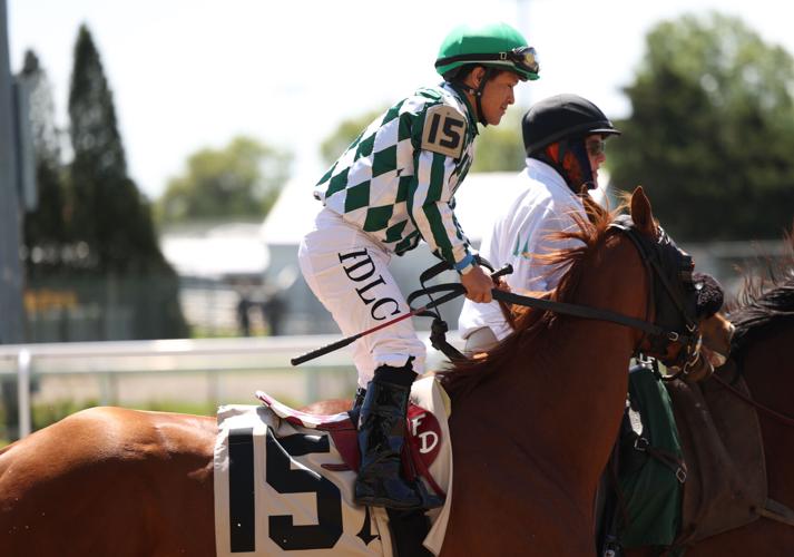 jockey cools down horse.JPG