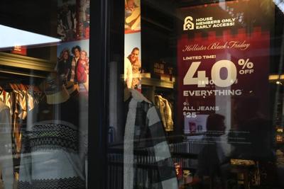 Black Friday ads in storefront windows