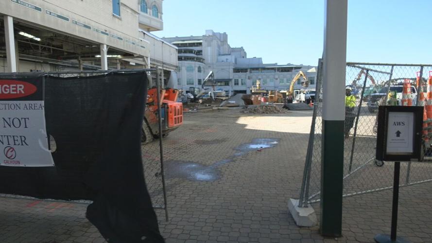 Construction crews at Churchill Downs work to build new paddock