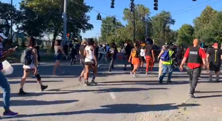 Louisville protesters march around Churchill Downs on Derby day