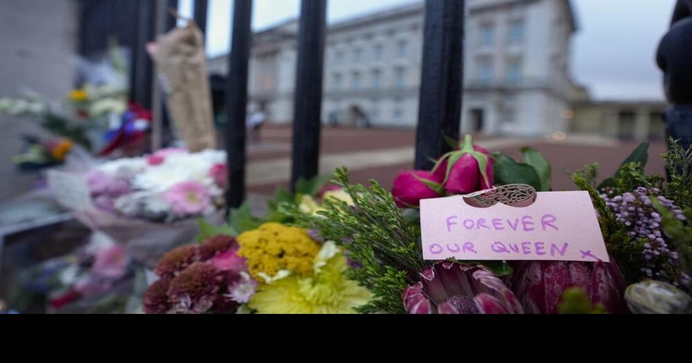 Flowers surround Buckingham Palace following Queen's passing