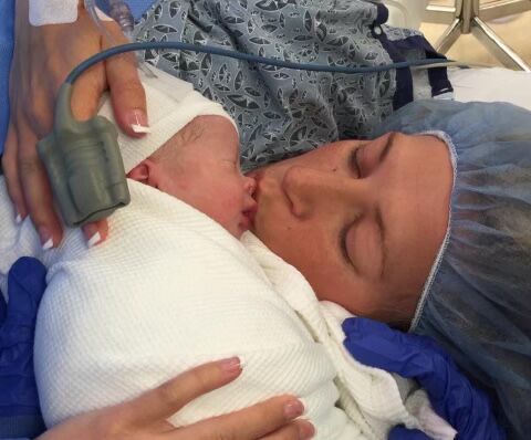 Katie kisses son shortly after birth